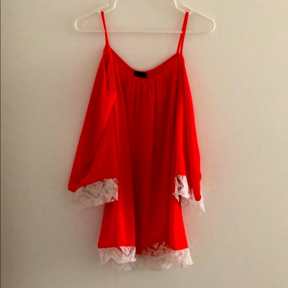 Coral blouse. Shows shoulders